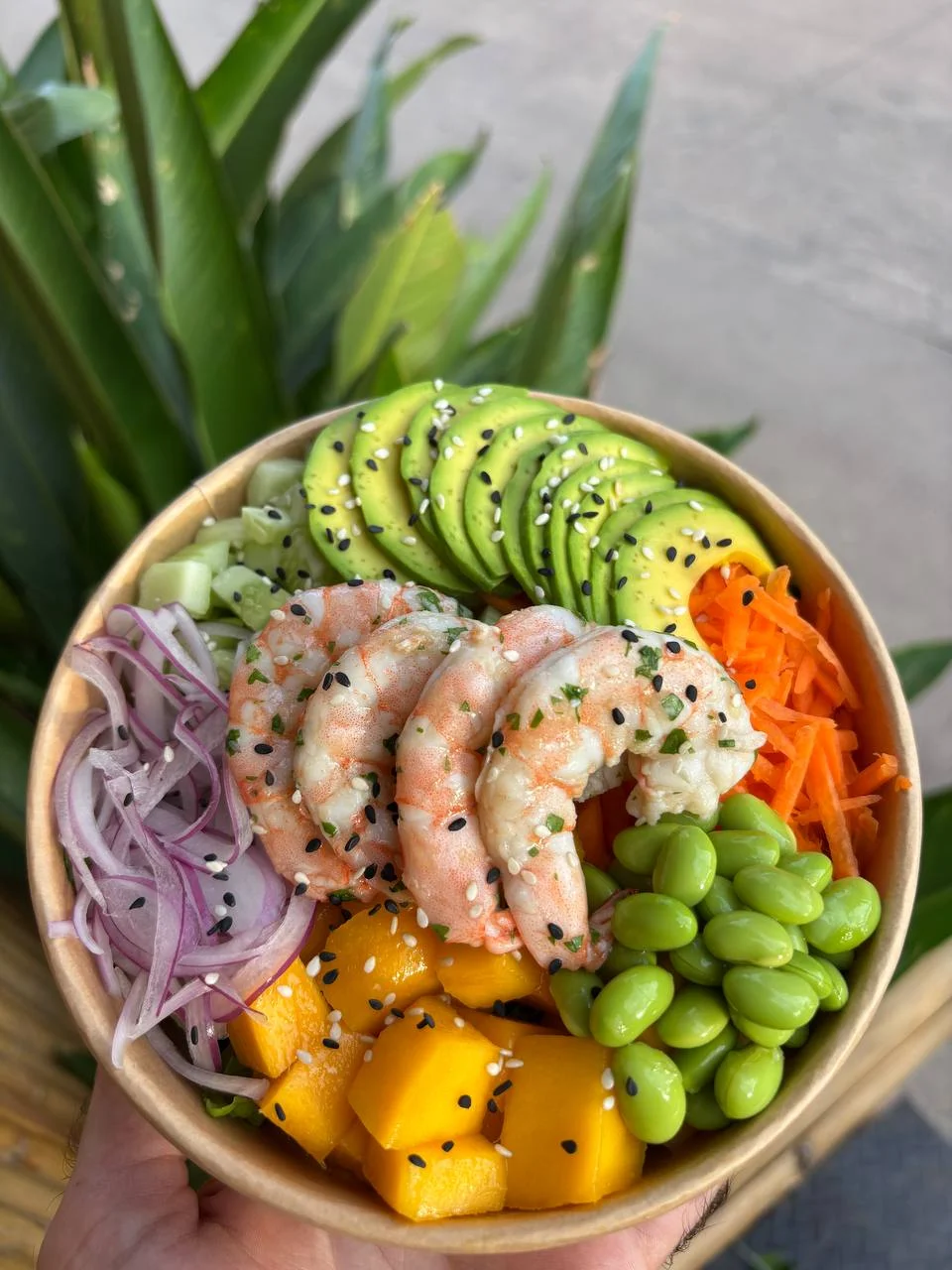 Shrimp poke bowl with mango and edamame
